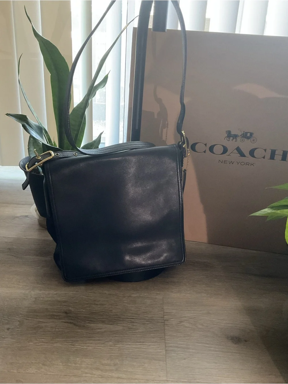 Coach Black Leather Messenger Bag with Gold Hardware